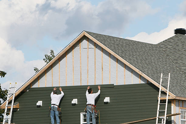 Professional Storm Damage Siding Repair technician working in West Point, GA